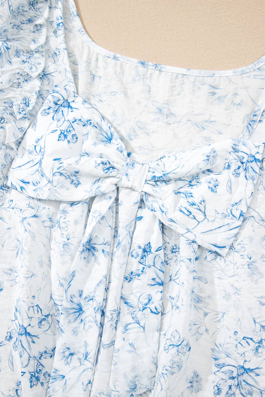 Blue Floral Ruffled Sleeve Bow Back Top