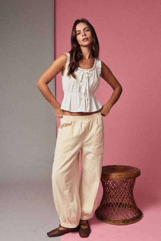 White Peplum Sleeveless Top