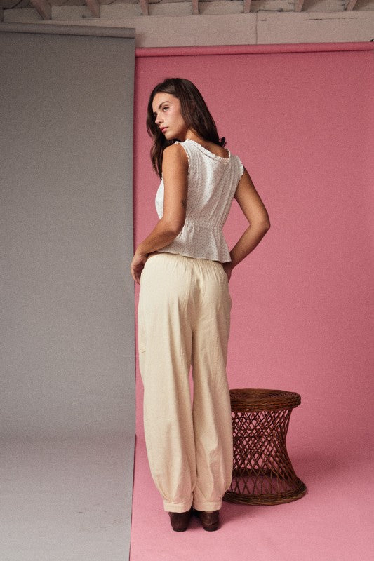 White Peplum Sleeveless Top